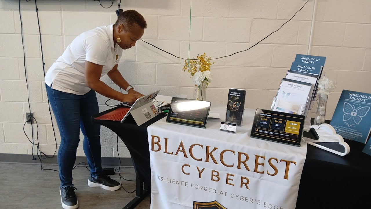 BlackCrest Cyber Shielded in Dignity booth at a community event