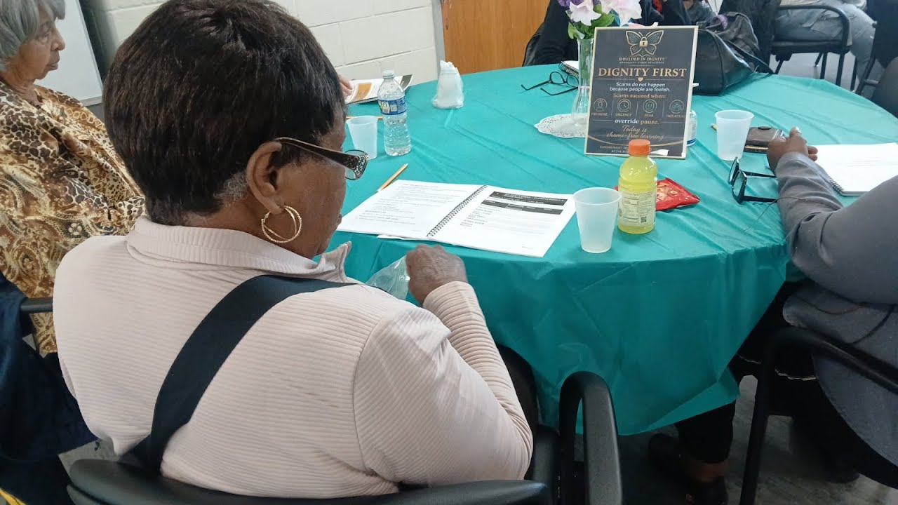 Participants engaged in a Shielded in Dignity workshop