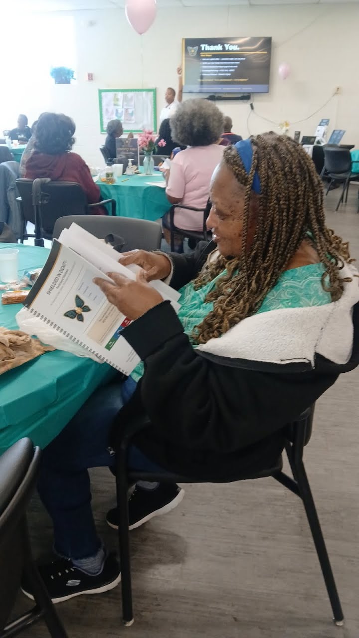 Participants engaged in a Shielded in Dignity workshop